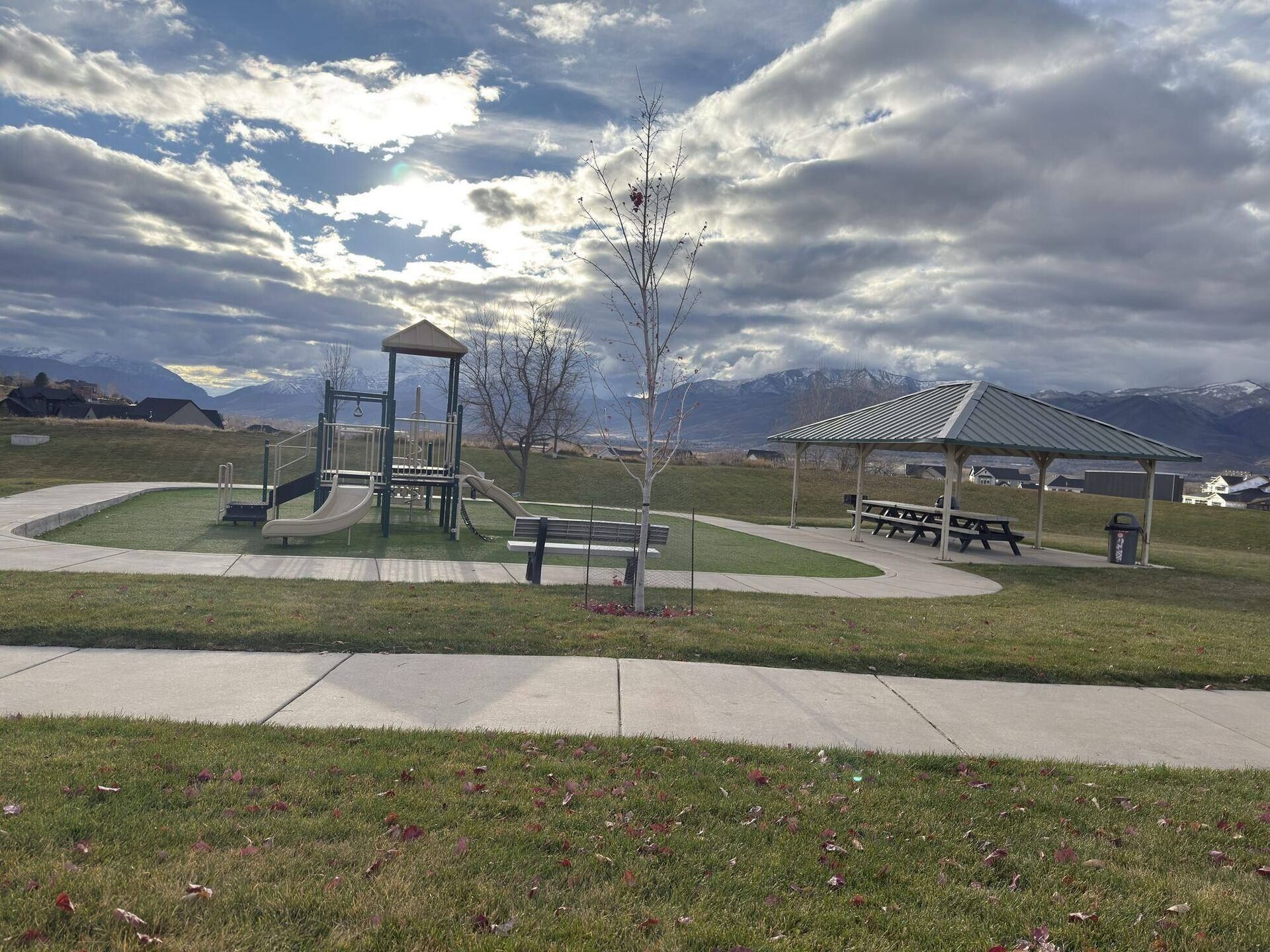 Jordanelle Ridge community park with mountain backdrop in Heber City Utah