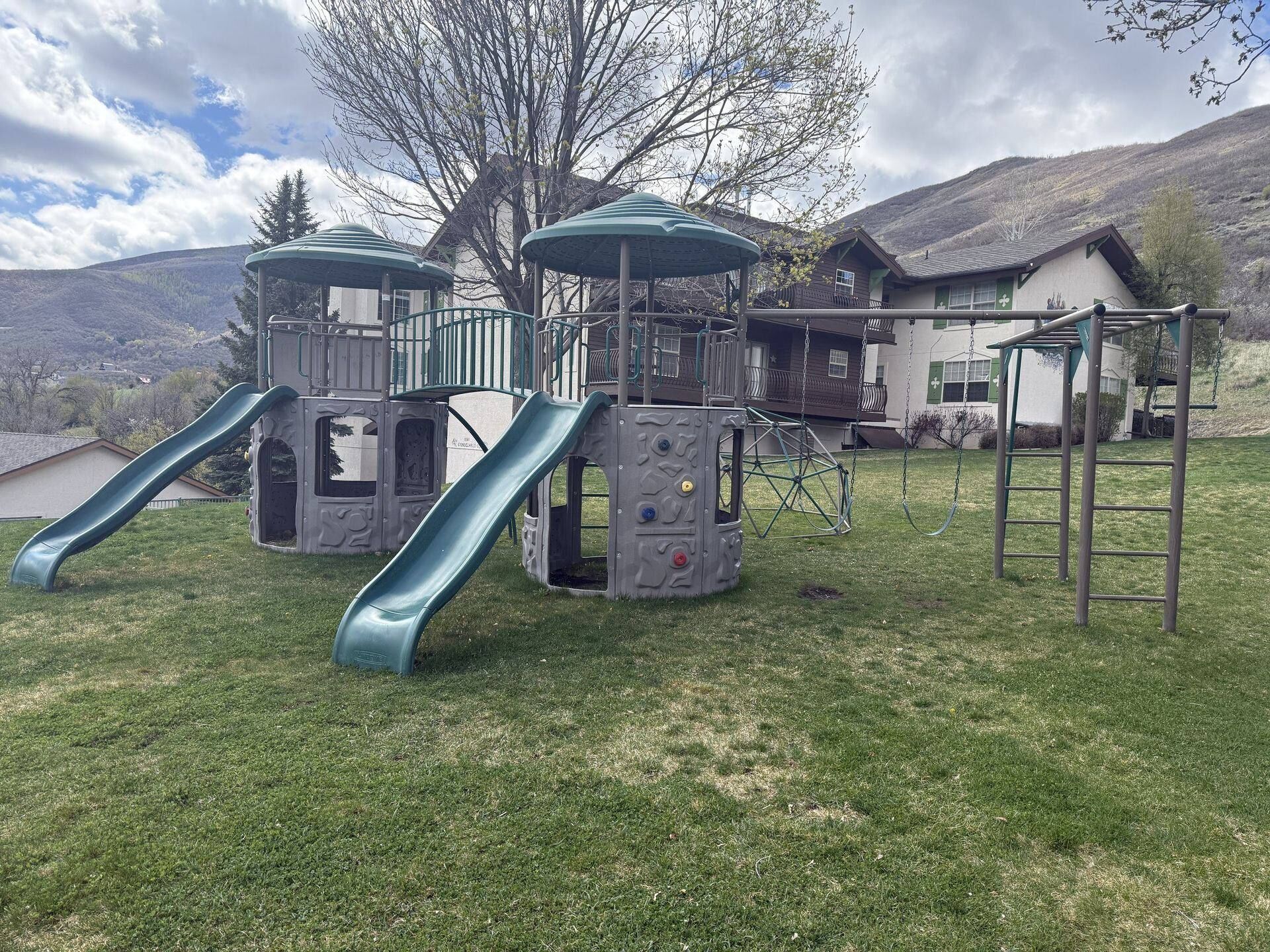Swiss Oaks community playground with mountain views in Midway