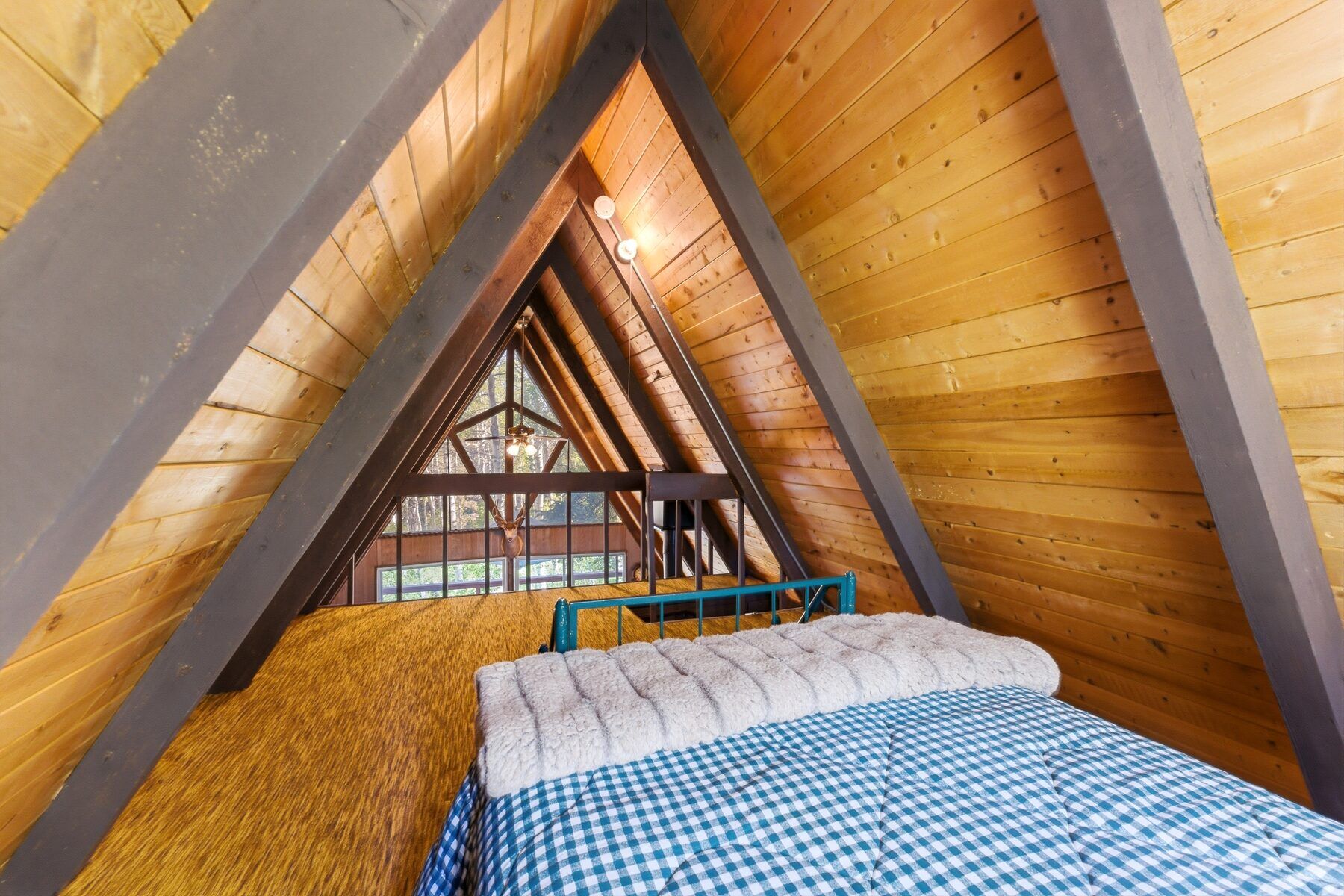 Bedroom with forest outlook in Heber City A-frame cabin for sale