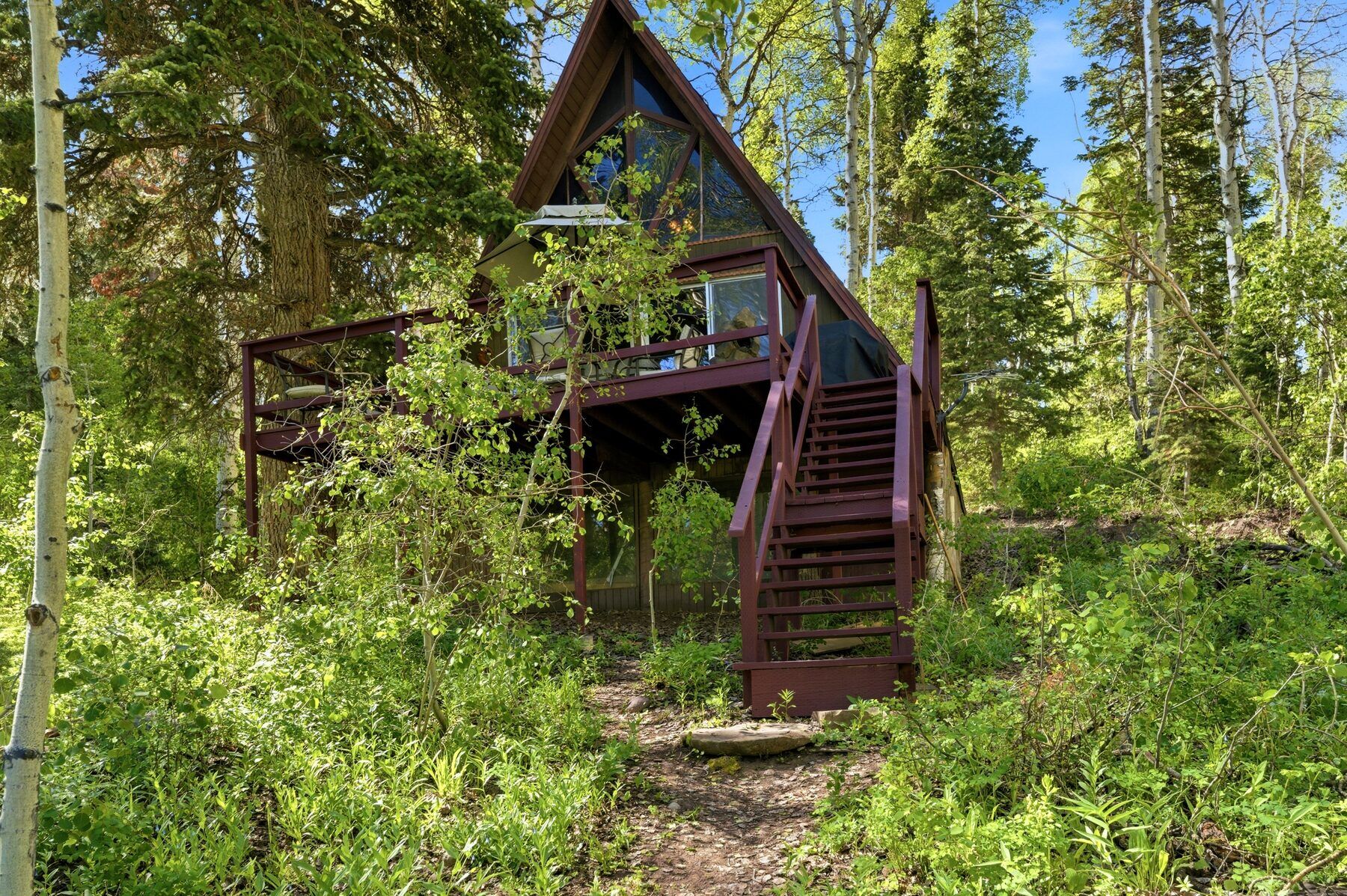 Secluded A-frame cabin for sale in the wooded Timber Lakes community Heber City