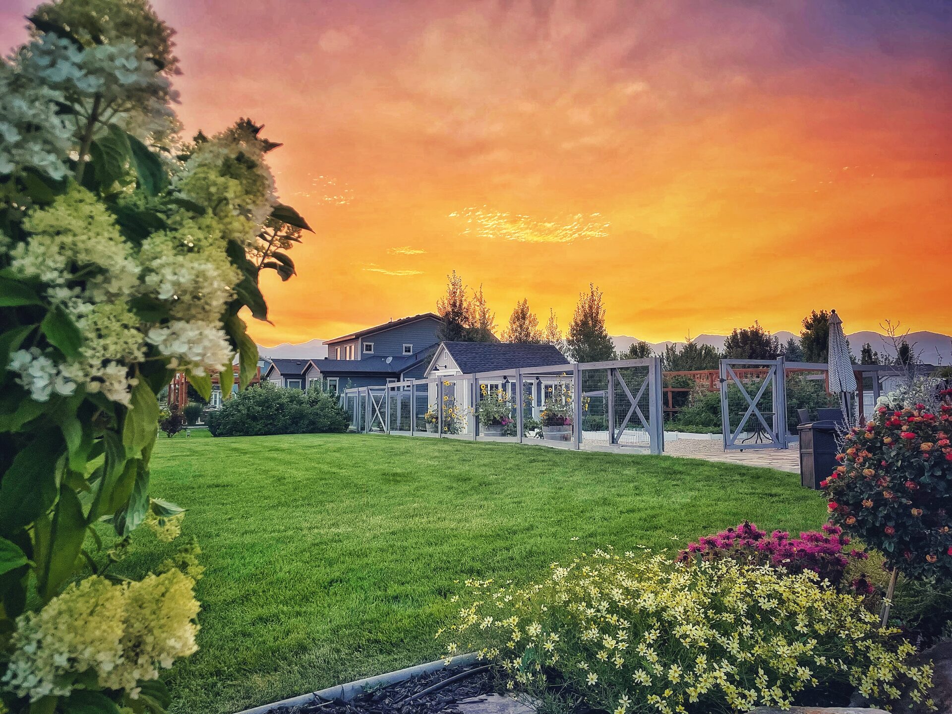 Heber Valley acreage property with garden and mountain views at sunset in Wasatch Back Utah